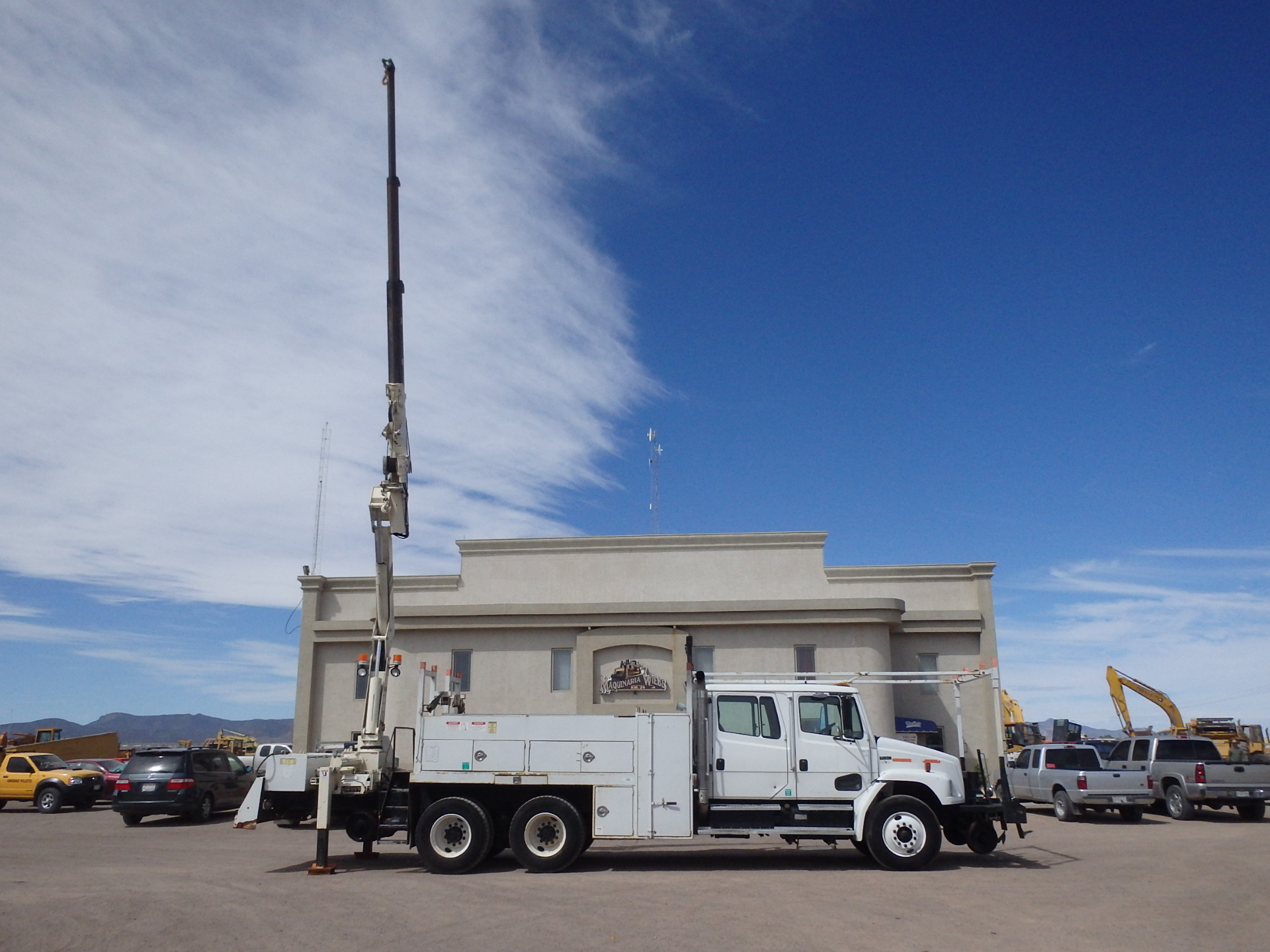 CAMION HAIL RAIL CON GRUA NATIONAL N80A